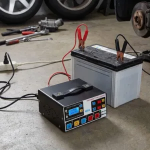 Încărcător Baterie Auto 12V/24V Factory cu Cleme Tip Crocodil – Redresor Inteligent pentru Autoturisme, Camioane și Motociclete: Putere, Siguranță și Mentenanță Proactivă